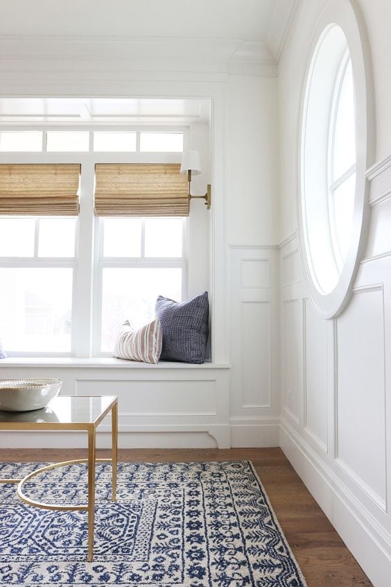 A bright room with large windows - painted with Simply White by Benjamin Moore