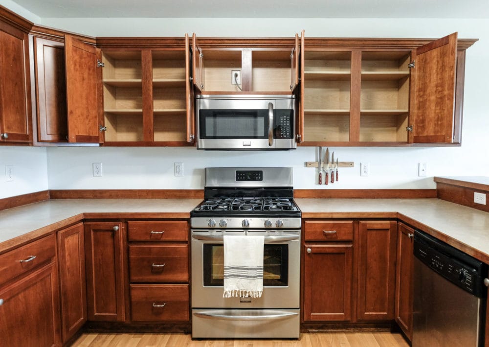 an empty kitchen getting ready to install cabinet lighting