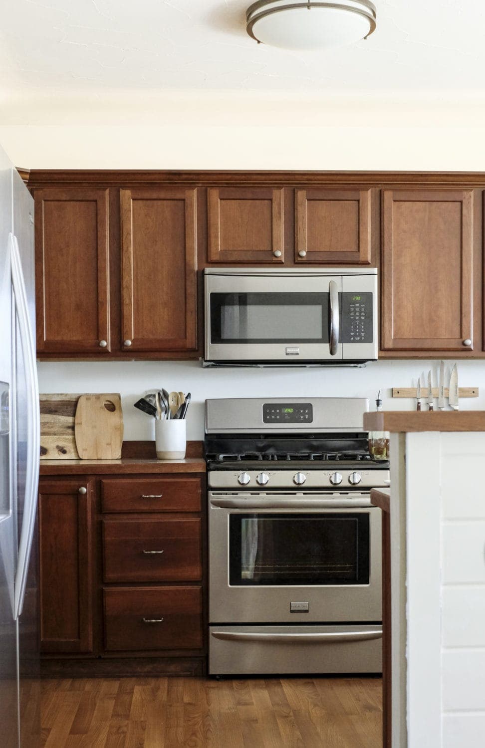 Budget kitchen with wood cabinets and stainless steel appliances