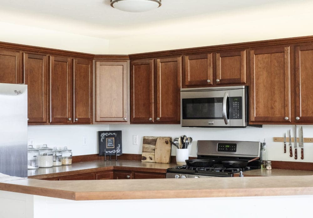 Budget kitchen with wood cabinets and laminate counter top