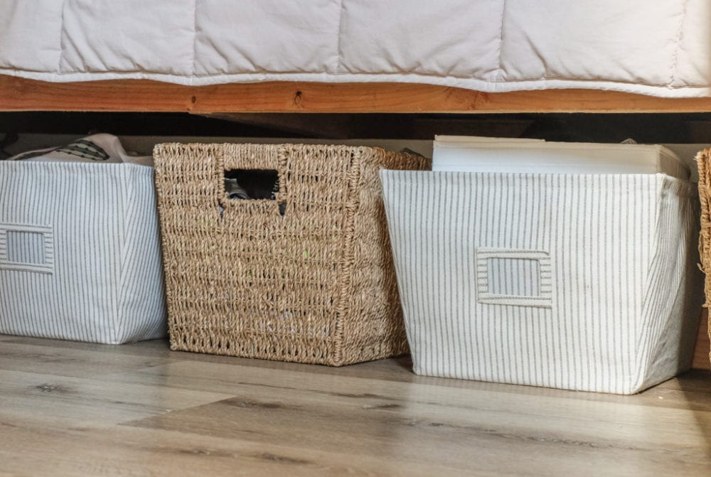 baby organization storage baskets under a bed