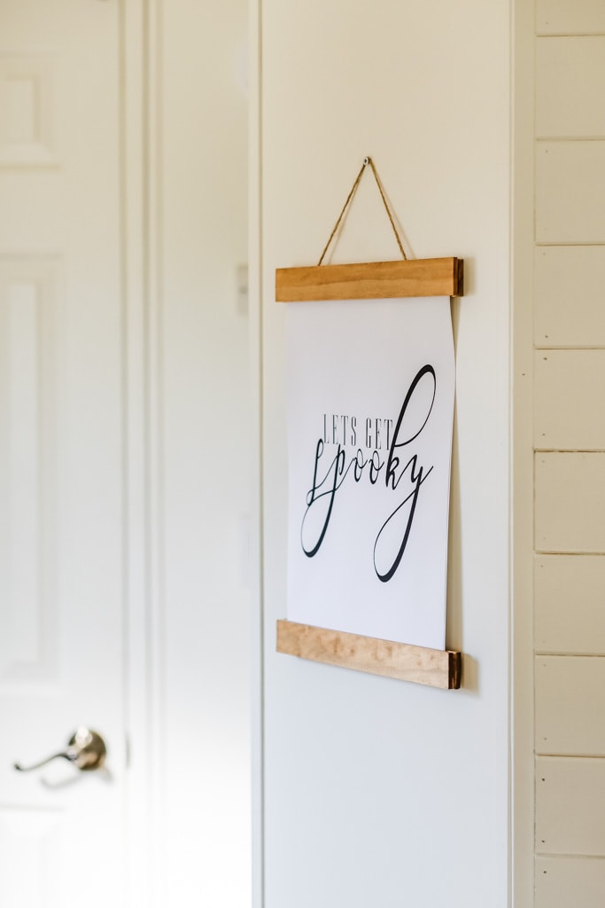 'let's get spooky' printable in a wooden hanging frame 