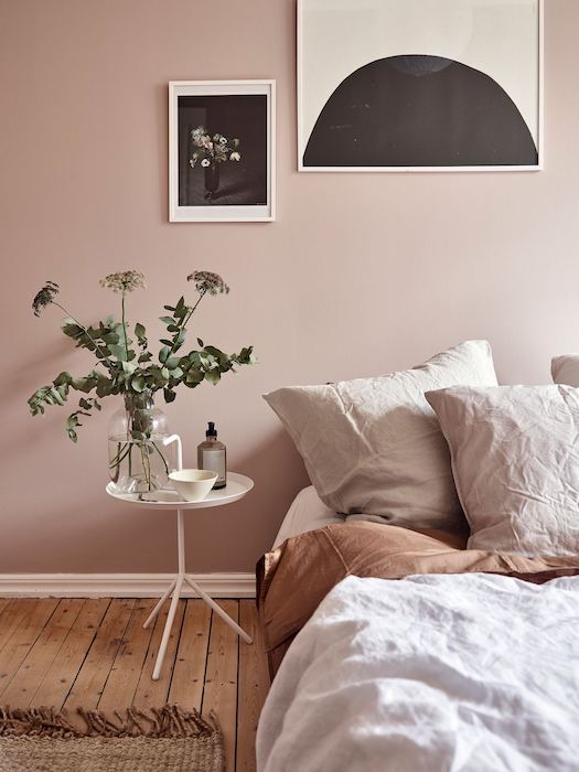 bedroom with pink jewel-toned painted walls