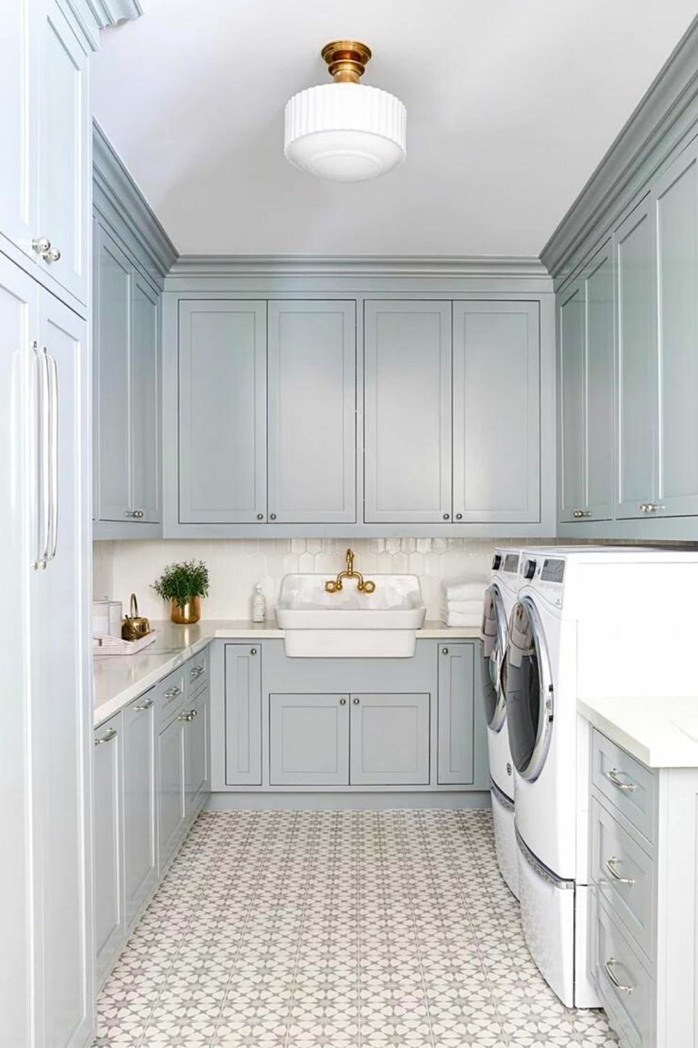 Laundry room cabinets painted with Smoke by Benjamin Moore