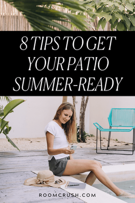 woman sitting by pool thinking about 8 ways to get your outdoor space ready for summer