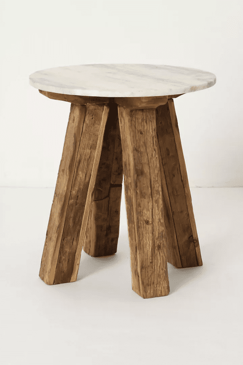 Marble top side table showing how materials should contrast in modern farmhouse decor