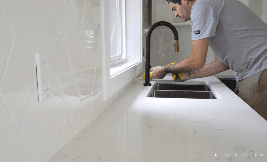 installing new quartz countertops 90s kitchen makeover.png